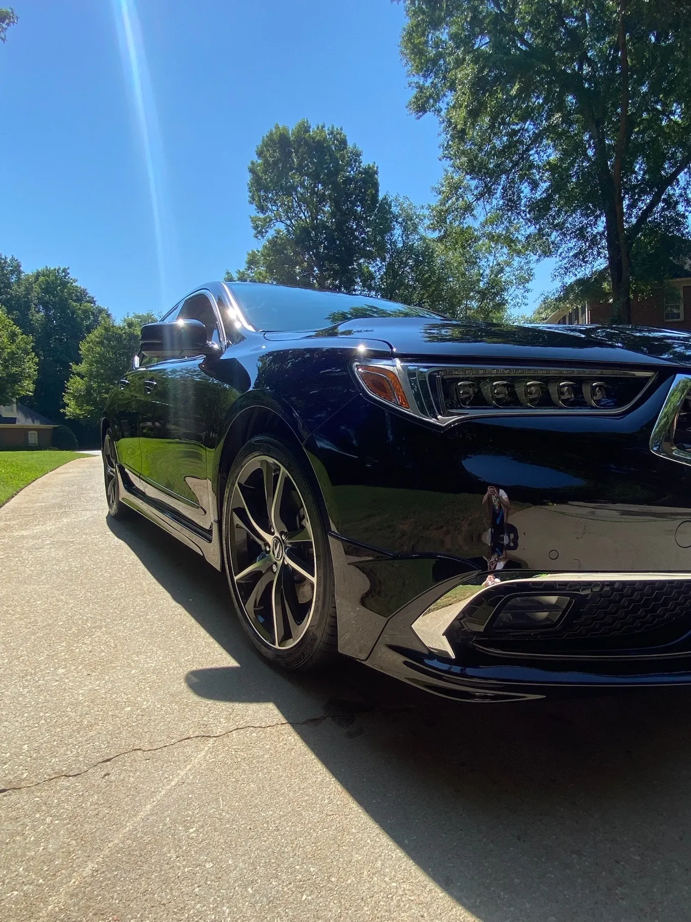 Finished black Acura after exterior detail